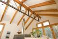 Trestlewood II Timber Frame / This is an interesting composite steel and wood frame Trestlewood II Timber Frame / This is an interesting composite steel and wood frame