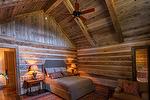 Hand-Hewn Timbers and Antique Barnwood T & G Ceiling and Antique Gray Barnwood and 2" Hand-Hewn Skins