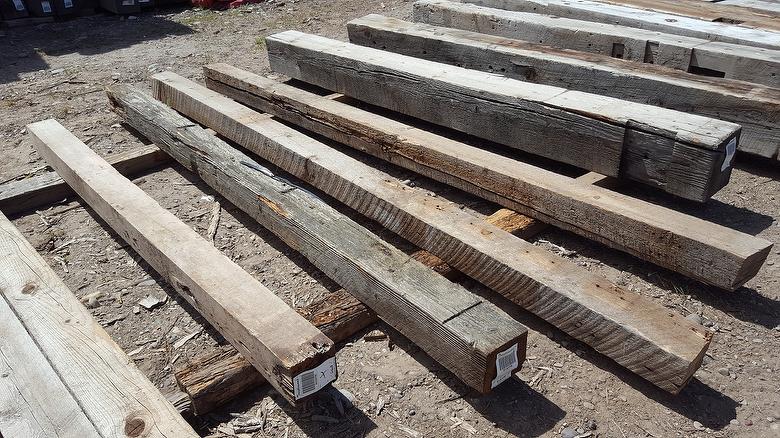 (4) 6x6 WeatheredBlend Timbers note cracks on one face of far right timber