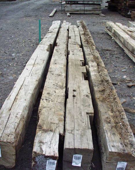 Hand Hewn Timbers / Note notches and slight surface rot on far right timber