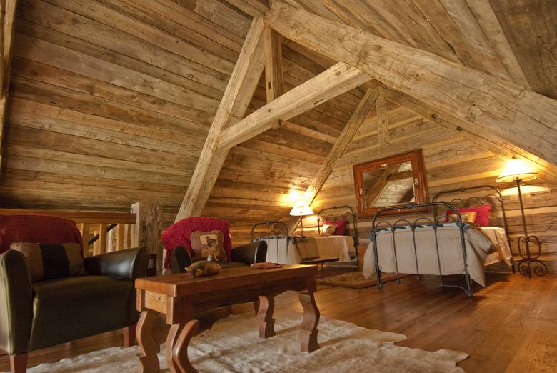 Hewn Skins, Hewn Timber Truss, Smooth Oak Floor, and Barnwood Ceiling