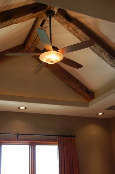 Hand Hewn Timbers in Ranch House Bedroom Ceiling