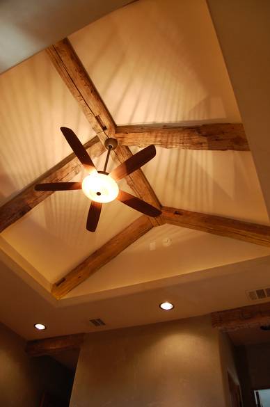Hand Hewn Timbers in Ranch House Bedroom Ceiling