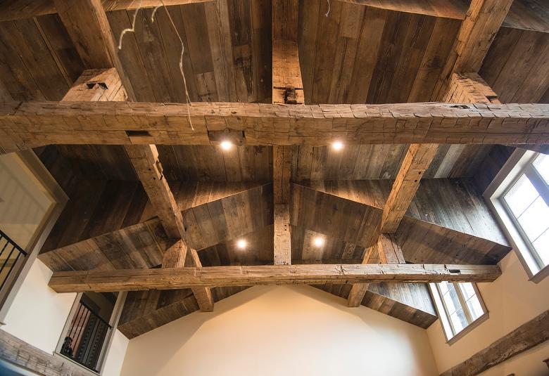 Hand-Hewn Timbers and NatureAged Barnwood Ceiling