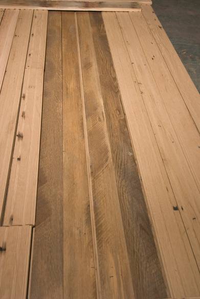 Skip-planed antique oak flooring / middle boards oriented face up