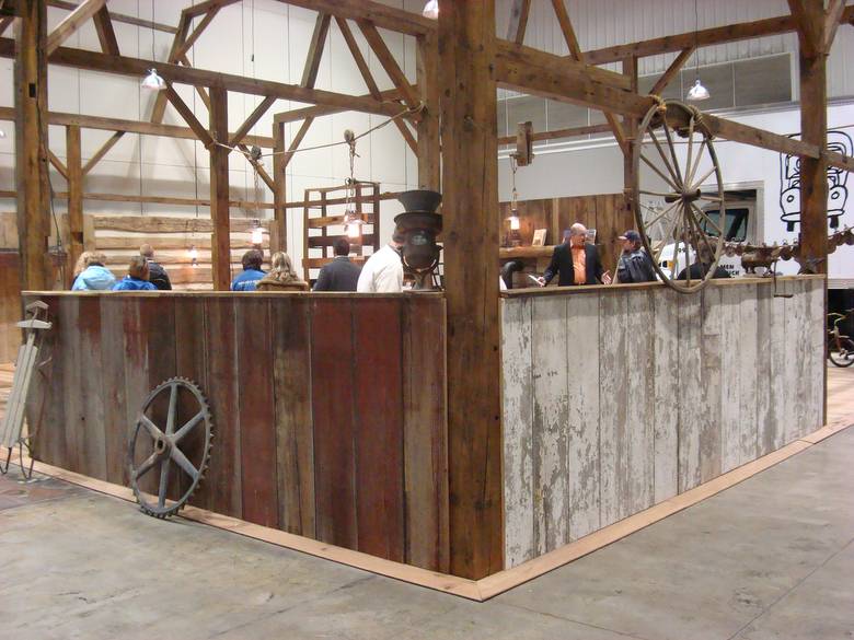 Front corner of Indianapolis booth / red painted barnwood, white painted barnwood