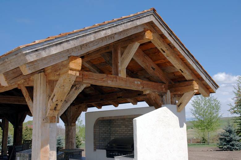 Hand-Hewn Timbers / This outdoor cooking pavilion was constructed with authentic hand-hewn timbers