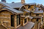 Hand-Hewn Timbers, Hand-Hewn Skins, and Antique Brown T&G Barnwood Siding (Soffit) - Rustic Deer Valley Home (UT)