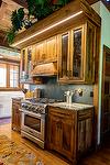 Antique Chestnut Lumber Cabinets and Skip-planed Oak Trim - (WY)