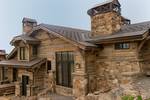 Hand-Hewn Timbers, Hand-Hewn Skins, and Antique Brown T&G Barnwood Siding (Soffit) - Rustic Deer Valley Home (UT)