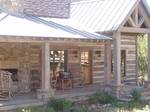 Weathered TWII Timbers and Hand Hewn Skins Siding