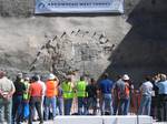 Tunnel Boring Machine breaking through a mountain face to finish Arrowhead Tunnel Project