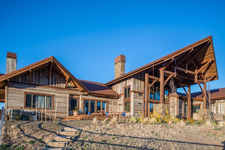 Hand-Hewn Weathered Middles and Mushroomwood Lumber in Entry Ceiling