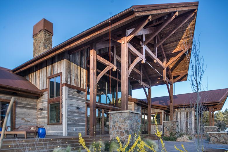 Hand-Hewn Weathered Middles and Mushroomwood Lumber in Entry Ceiling