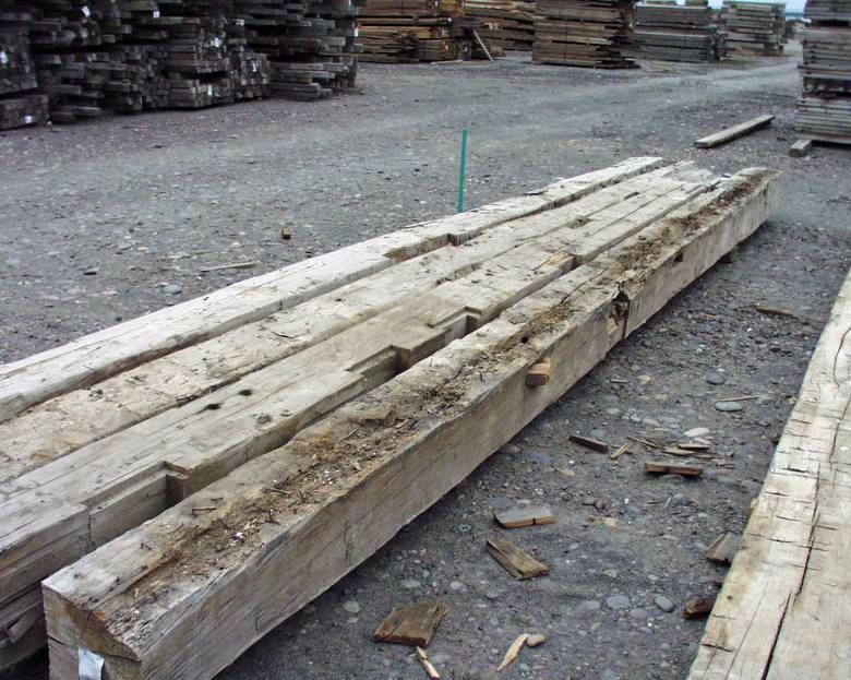 Hand Hewn Timbers / slight surface rot on far right timber