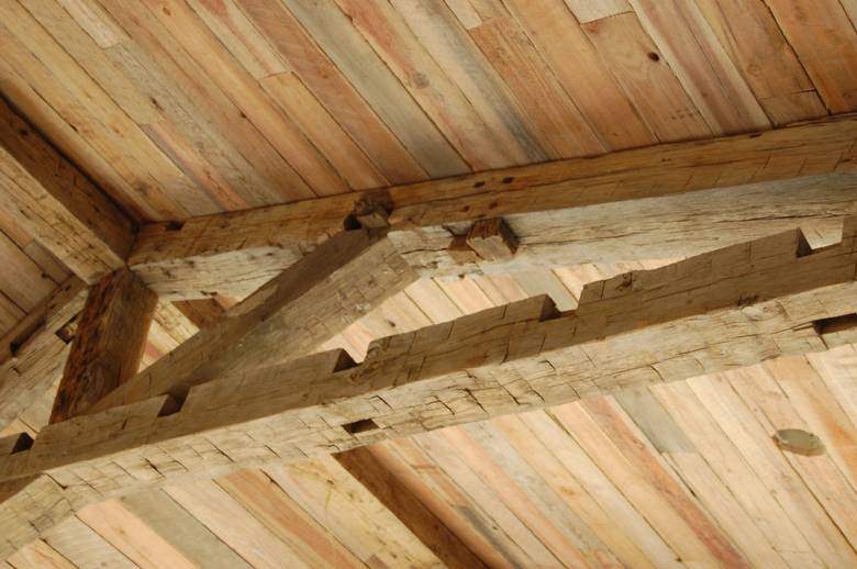 Hand Hewn Oak Trusses and TWII Resawn Slab Ceiling