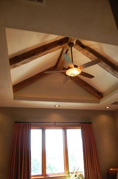 Hand Hewn Timbers in Ranch House Bedroom Ceiling