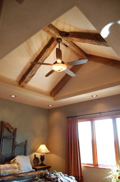 Hand Hewn Timbers in Ranch House Bedroom Ceiling