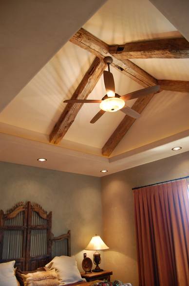 Hand Hewn Timbers in Ranch House Bedroom Ceiling