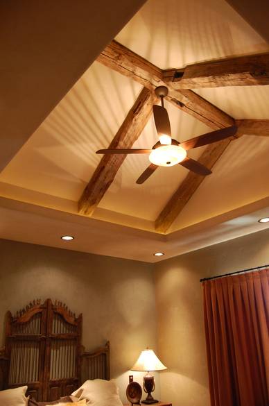 Hand Hewn Timbers in Ranch House Bedroom Ceiling