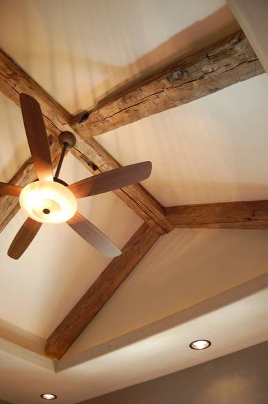 Hand Hewn Timbers in Ranch House Bedroom Ceiling