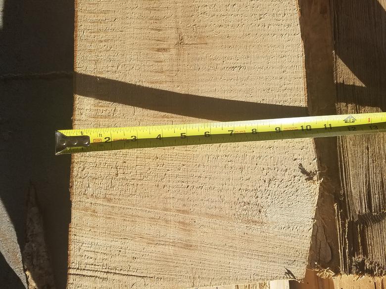 This board is 10" on one end, 12" on the other.  To get to 10"/11" an 8' board would be cut down to 6'.