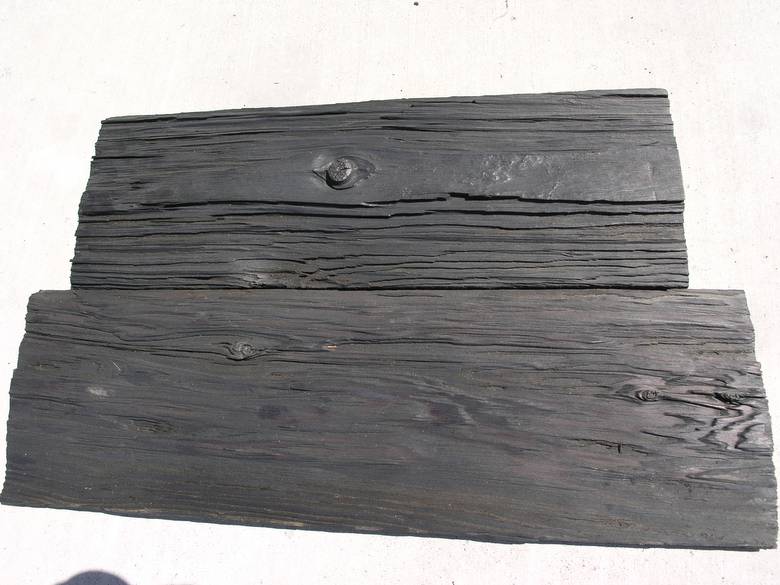 Surface has been brush sanded - ebony penetrating stain