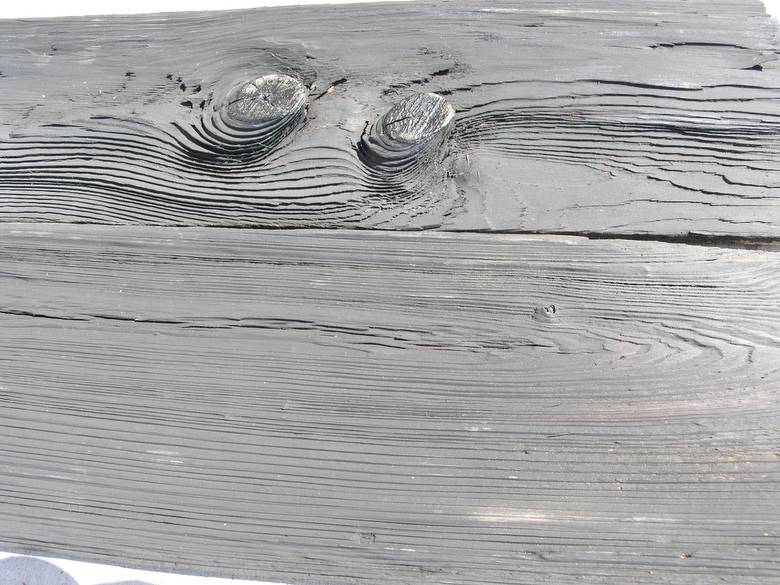 Surface has been brush sanded - ebony polyshade