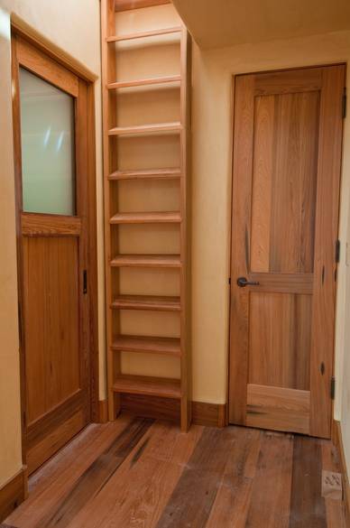 Cypress floor, door, and cabinet