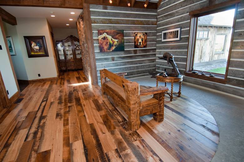 Trailblazer Mixed-Hardwood Skipped Flooring; Bench made from hewn timbers and sleeper middles.