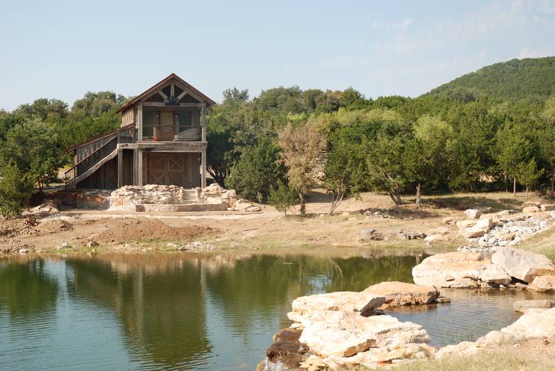 Garage and Guest Quarters viewed across the Pond