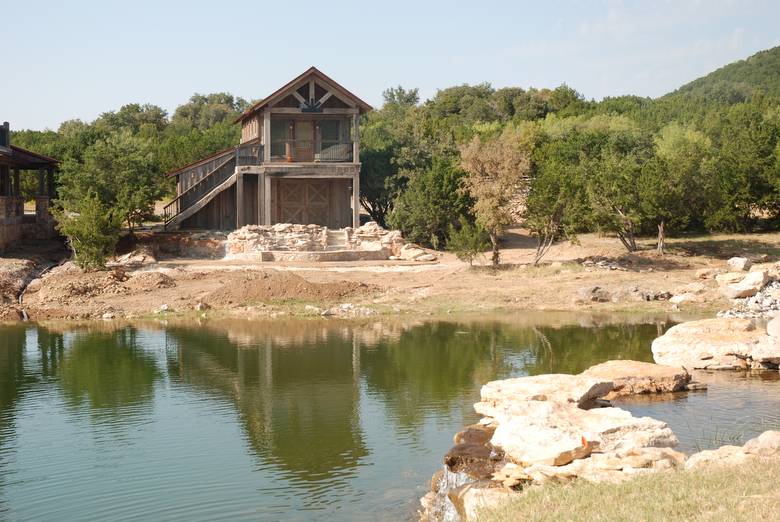 Garage and Guest Quarters viewed across the Pond