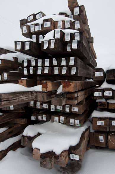 Primarily Oak Hewn Timbers (The 6 x 6 in the 2nd and 3rd unit down are weathered pine)