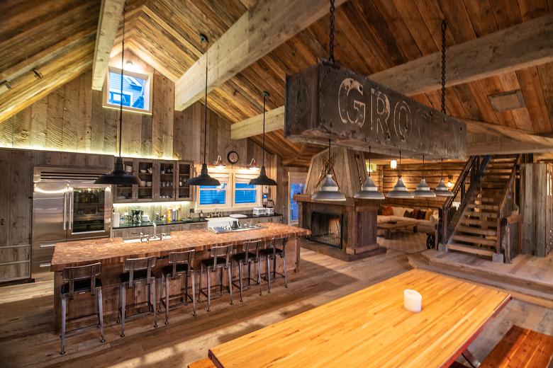 NatureAged beam wraps, paneling and cabinets. Antique Barnwood Gray/Brown ceiling, Trailblazer Skip-Planed flooring (60% Skipped), and Hand-Hewn Skins paneling (pressure washed)