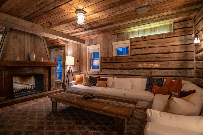 NatureAged beam wraps, paneling and cabinets. Antique Barnwood Gray/Brown ceiling, Trailblazer Skip-Planed flooring (60% Skipped), and Hand-Hewn Skins paneling (pressure washed)