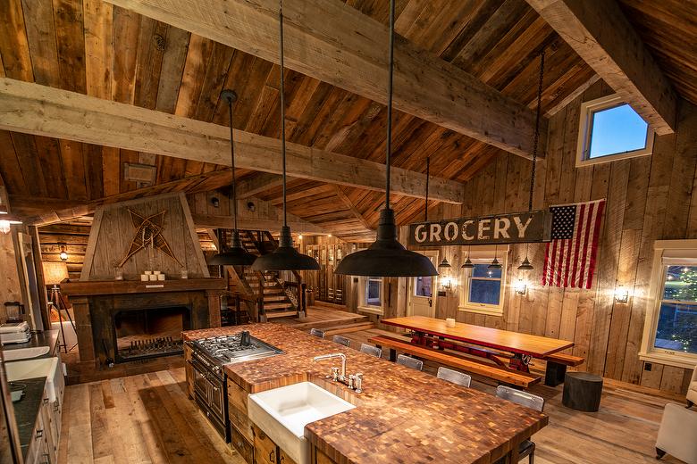 NatureAged beam wraps, paneling and cabinets. Antique Barnwood Gray/Brown ceiling, Trailblazer Skip-Planed flooring (60% Skipped), and Hand-Hewn Skins paneling (pressure washed)