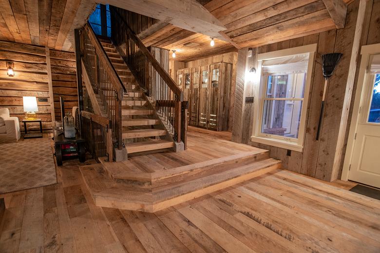 NatureAged beam wraps, paneling and cabinets. Antique Barnwood Gray/Brown ceiling, Trailblazer Skip-Planed flooring (60% Skipped), and Hand-Hewn Skins paneling (pressure washed)