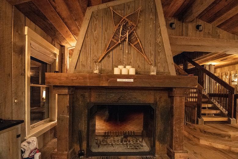 NatureAged beam wraps, paneling and cabinets. Antique Barnwood Gray/Brown ceiling, Trailblazer Skip-Planed flooring (60% Skipped), and Hand-Hewn Skins paneling (pressure washed)