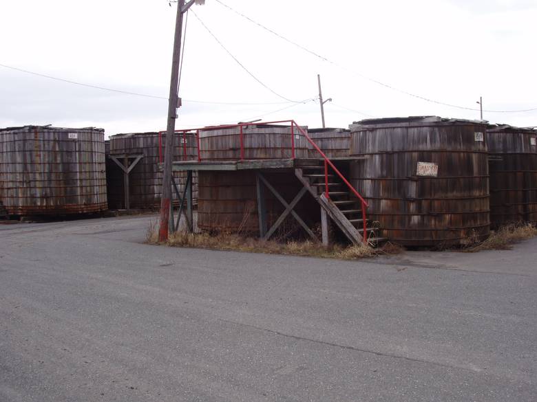 Pickle Tanks from Ground Level / These are wooden pickle vats in a pickle processing plant