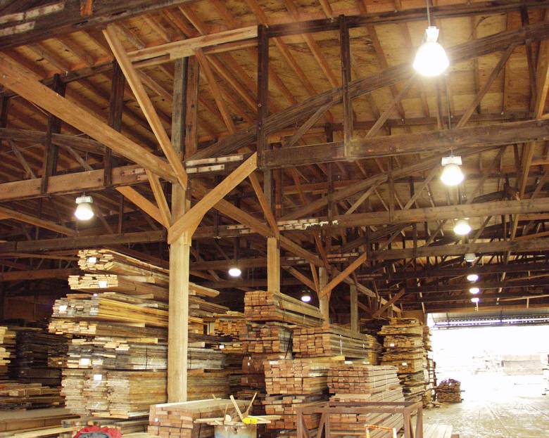 Reclaimed Trusses / TWII C-S Lumber and 59' Bowstring Trusses