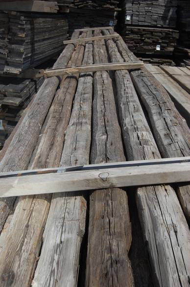 Round Barn Rafters (one side hewn)