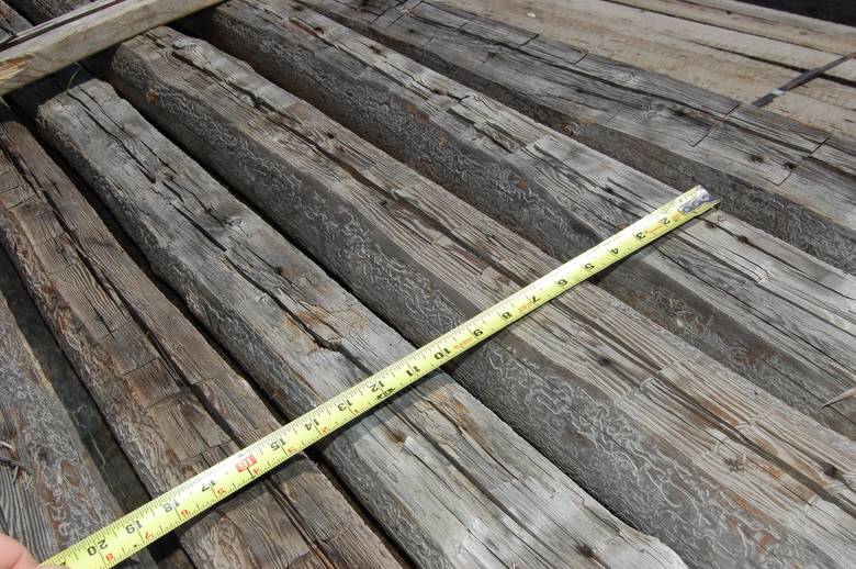 Round Barn Rafters (one side hewn)