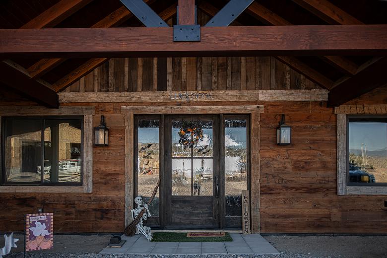 Antique Smooth Brown Barnwood Shiplap Siding, Picklewood Bottoms Board-and-Bat Siding, and Hand-Hewn Timbers