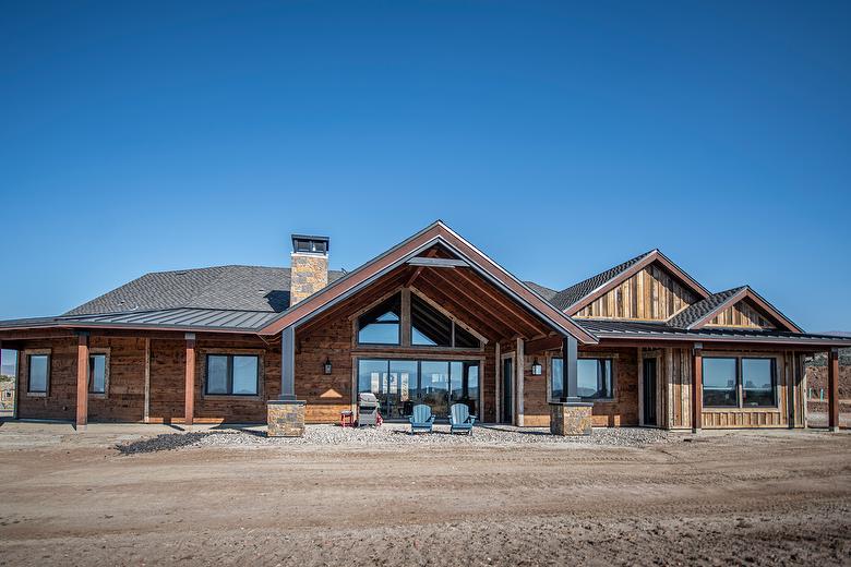 Antique Smooth Brown Barnwood Shiplap Siding, Picklewood Bottoms Board-and-Bat Siding, and Hand-Hewn Timbers