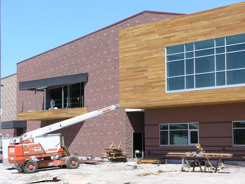 TWII Band-Sawn siding, soffit, facia and beams wraps.