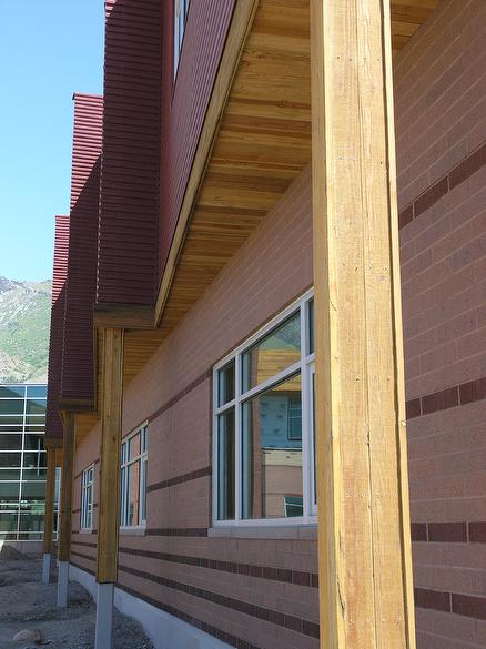 TWII Band-Sawn siding, soffit, facia and beams wraps.