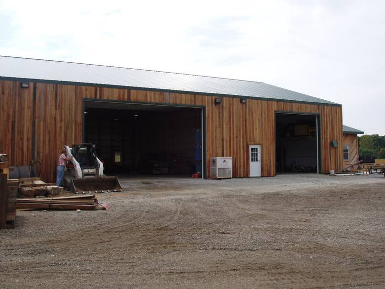 North Side of Warehouse  / The siding is TWII resawn slabs; the doors are 18' and 12'