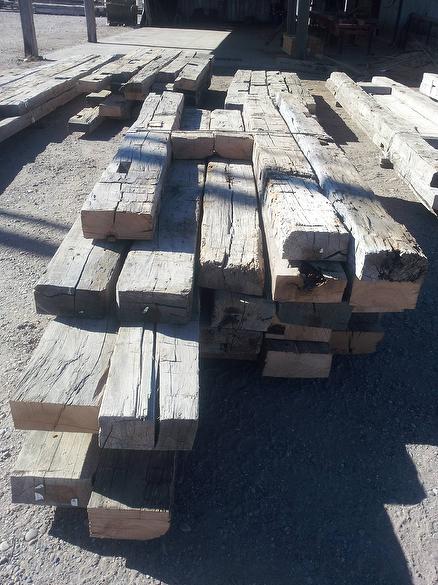 All of these hewn timbers are cut on one face (hidden)