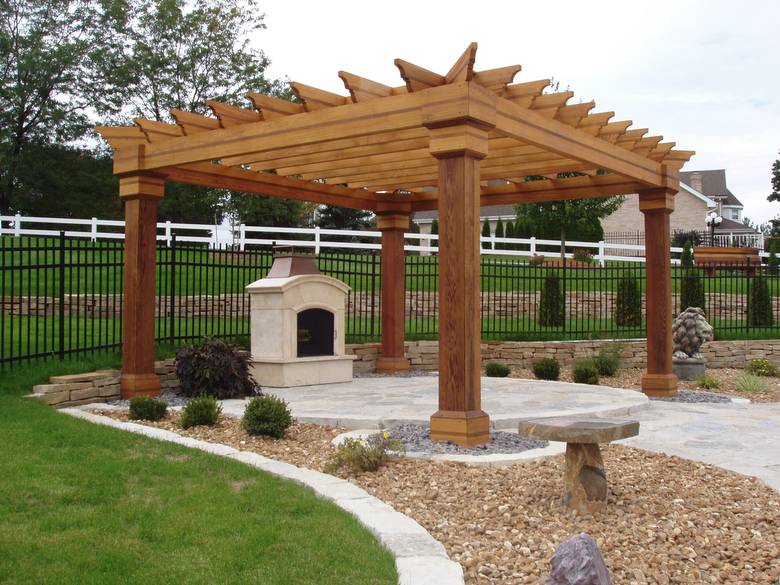 Pergola and Fireplace / The pergola over the outdoor fireplace is old-growth redwood and cypress