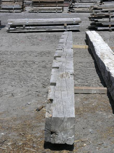 Hand Hewn Timbers / Note thicker in middle than on the ends